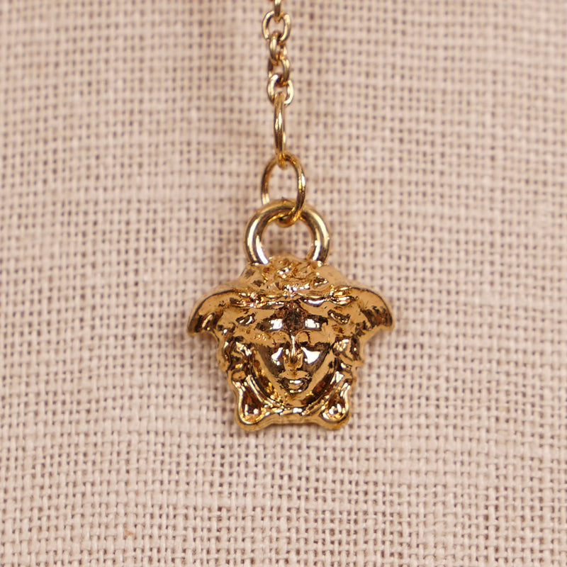 NEW $625 VERSACE Tribute Gold Brass MICRO CHARM Logo MEDUSA, GRECA & V NECKLACE