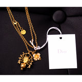 NEW $660 CHRISTIAN DIOR Mille Fleurs de SPIDER & FLOWER CHARM Gold Tone NECKLACE