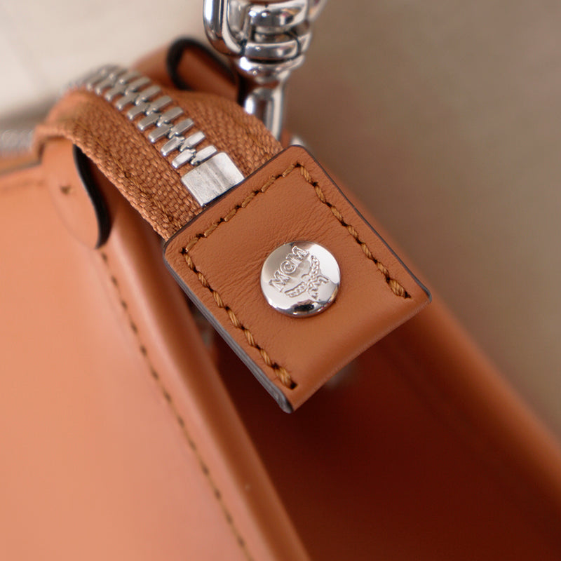 NEW $850 MCM Cognac Spanish Calf Leather LOGO AREN MESSENGER WRISTLET STRAP BAG