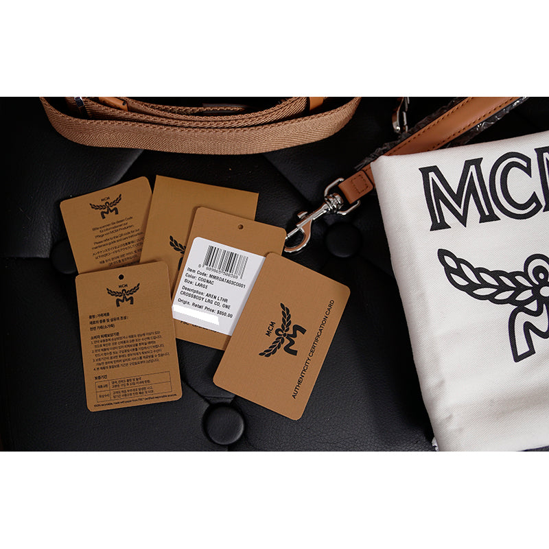 NEW $850 MCM Cognac Spanish Calf Leather LOGO AREN MESSENGER WRISTLET STRAP BAG