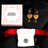 NEW $650 ALEXANDER MCQUEEN Gold Brass Crystal LOGO HEART HOOP SKULL EARRINGS