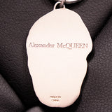 NEW $195 ALEXANDER MCQUEEN Silver Tone Brass GRINNING LOGO SKULL KEYRING NIB